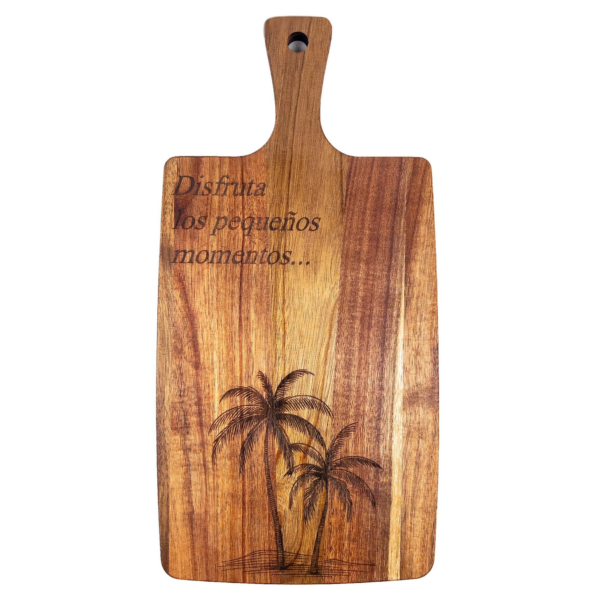 Wooden cutting board with palm tree design and Spanish text on a white background. Acacia wood laser engraved charcuterie board and serving board handmade in Spain 