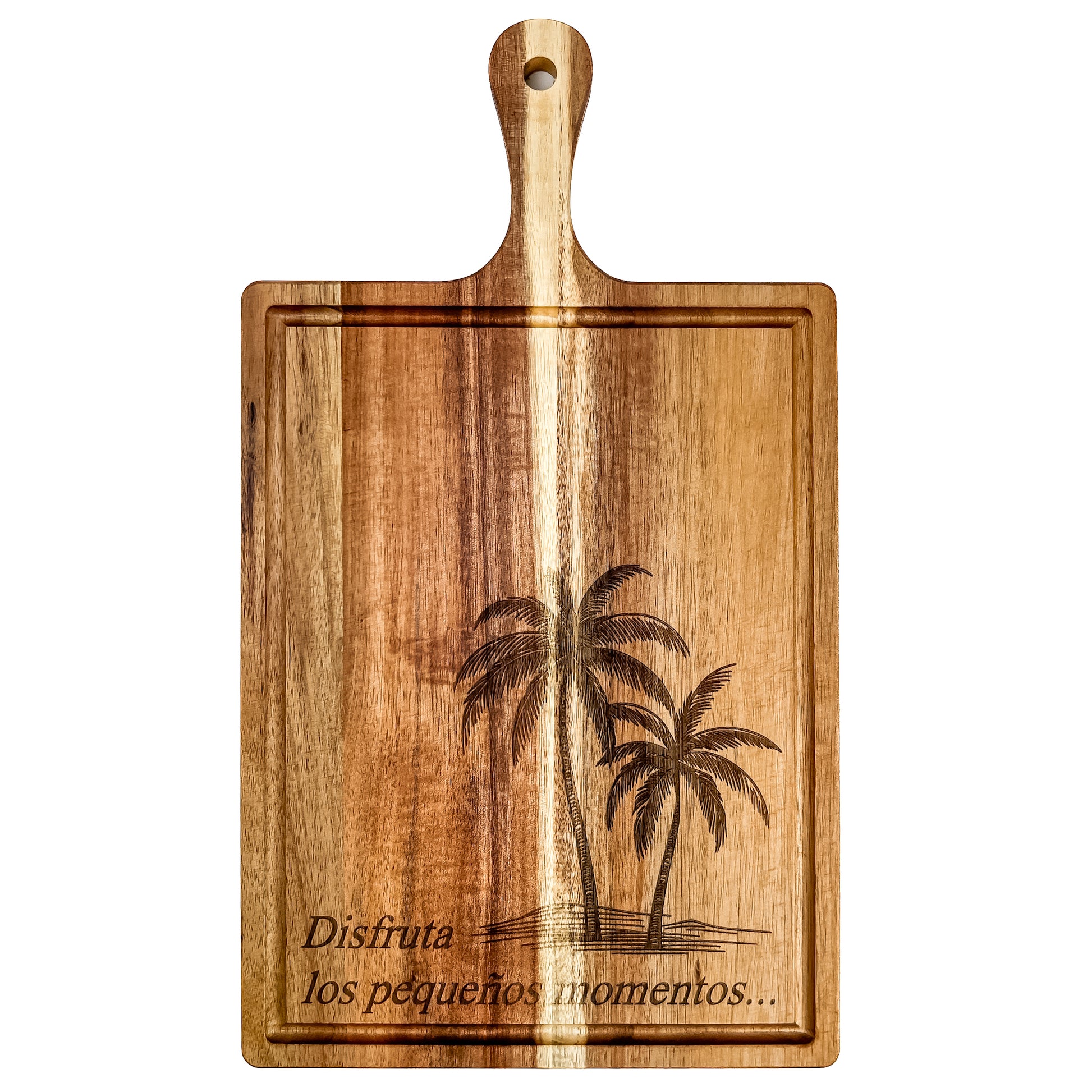 Wooden cutting board with palm tree design and Spanish text on a white background. Acacia wood laser engraved charcuterie board and serving board handmade in Spain 
