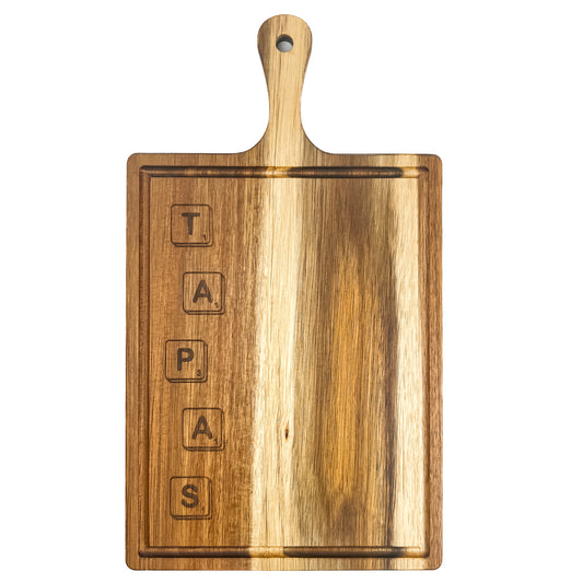 Wooden cutting board with 'TAPAS' engraved on a white background
Acacia wood laser engraved serving board handmade in Spain 