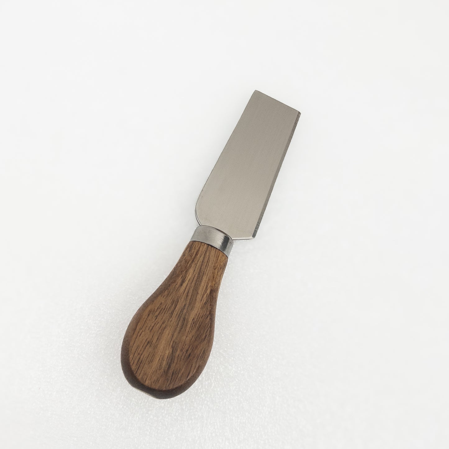 Cheese knife with acacia wooden handle and metal blade on a white background