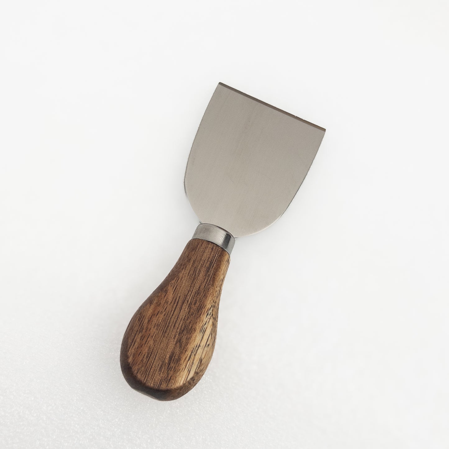 Cheese knife with an acacia wooden handle on a white background