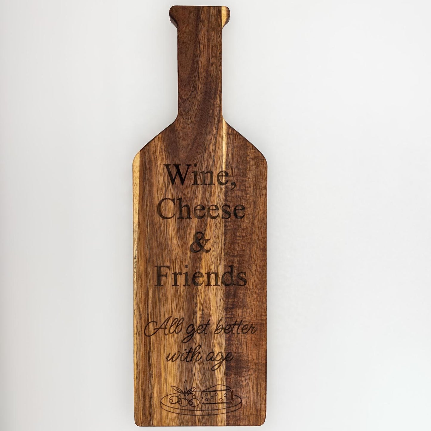 Wooden cutting board with engraved text on a white background