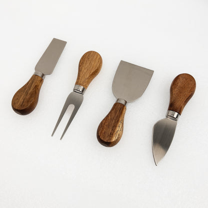 Four cheese knives with acacia handles on a white background