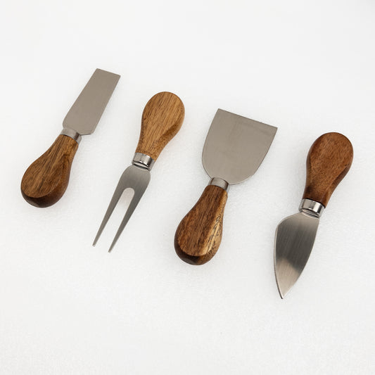 Four cheese knives with acacia handles on a white background